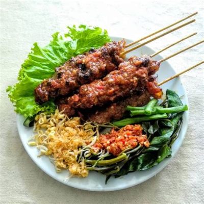  Sate Rembiga: Een overheerlijke mix van kruidige marinade en zoete sambal-saus!